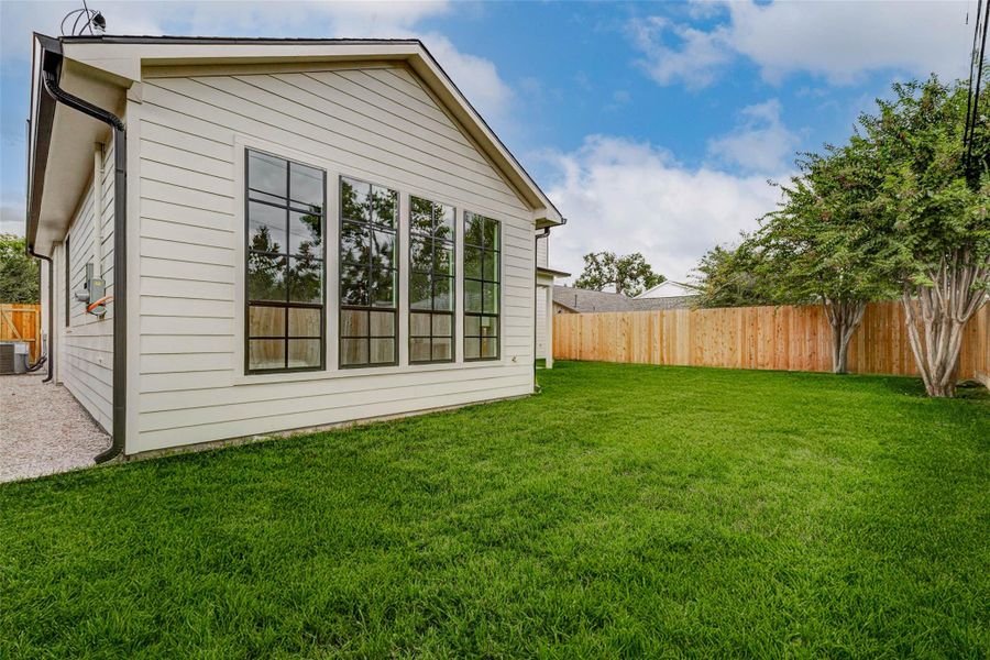 Exterior details and patio area of a home in , Houston (Image 27). Exterior details and patio area of a home in , Houston (Image 27).