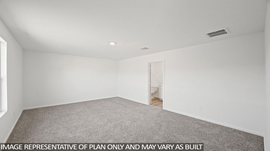 Unfurnished bedroom featuring light colored carpet and baseboards