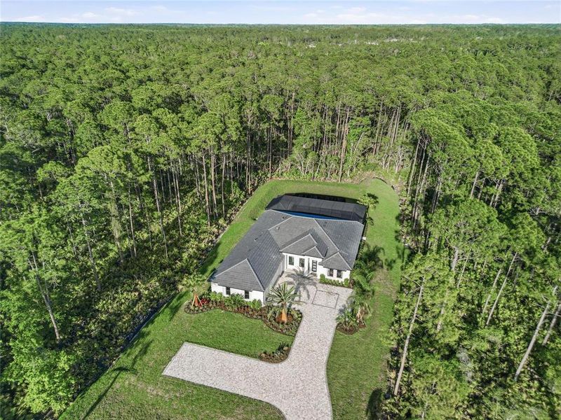 Front exterior of a new home in , Ormond Beach, FL, highlighting curb appeal (Image 22).