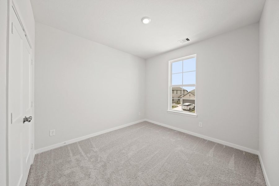 Spacious, unfurnished interior of a new home in Creekland Village at Bridgeland, Cypress (Image 17).