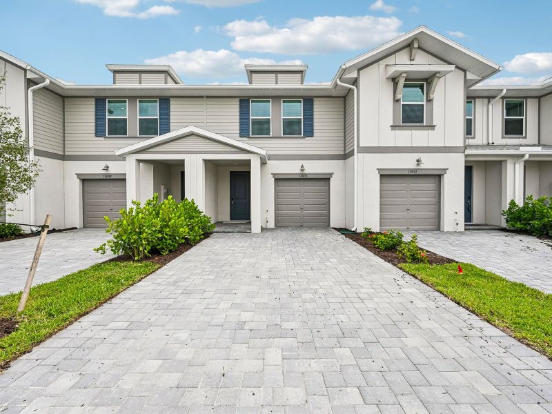 Front exterior of a new home in Meritage Homes at Central Park, Port St. Lucie, FL, highlighting curb appeal (Image 15). Front exterior of a new home in Meritage Homes at Central Park, Port St. Lucie, FL, highlighting curb appeal (Image 15).