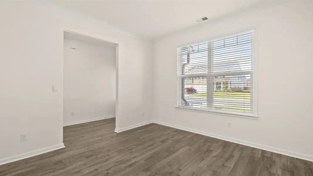 Spacious, unfurnished interior of a new home in The Highlands at Cedar Hill Landing, Navassa (Image 13).