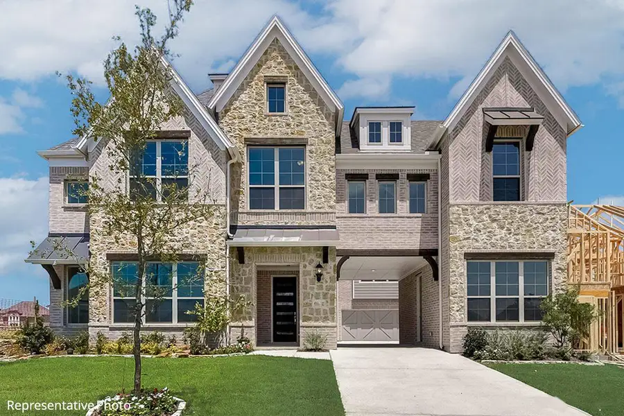 Front exterior of a new home in Grand Estates of Anna, Anna, TX, highlighting curb appeal (Image 1). Front exterior of a new home in Grand Estates of Anna, Anna, TX, highlighting curb appeal (Image 1).
