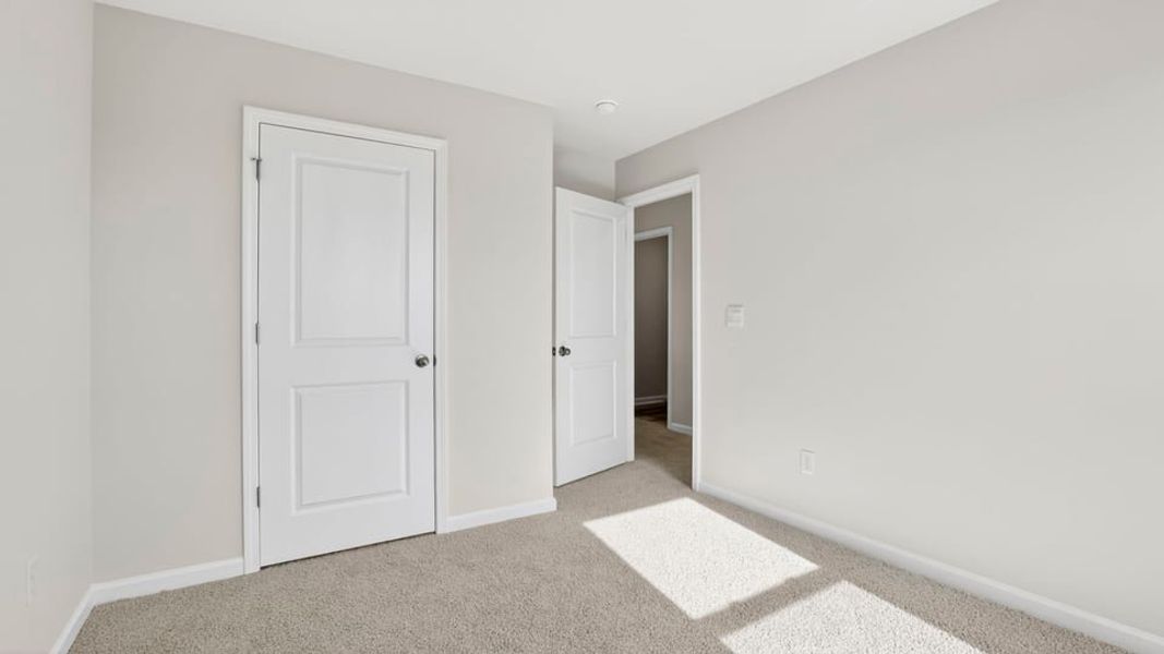 Spacious, unfurnished interior of a new home in Durbin Meadows Traditions, Fountain Inn (Image 27).