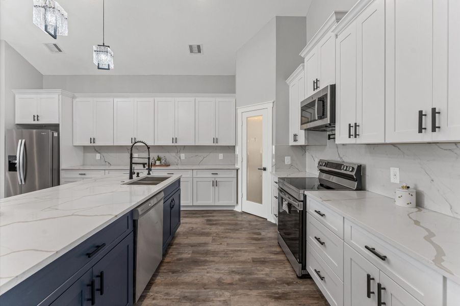 Abundant cabinetry with soft-close drawers and modern hardware for both beauty and functionality. Abundant cabinetry with soft-close drawers and modern hardware for both beauty and functionality.