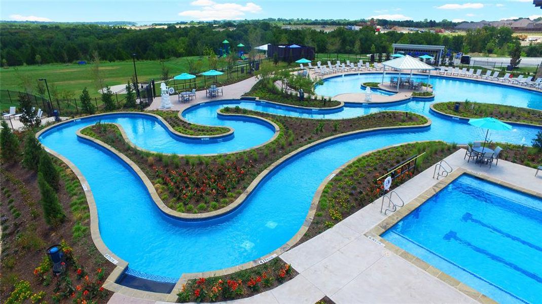 View of swimming pool with a jacuzzi and a patio area