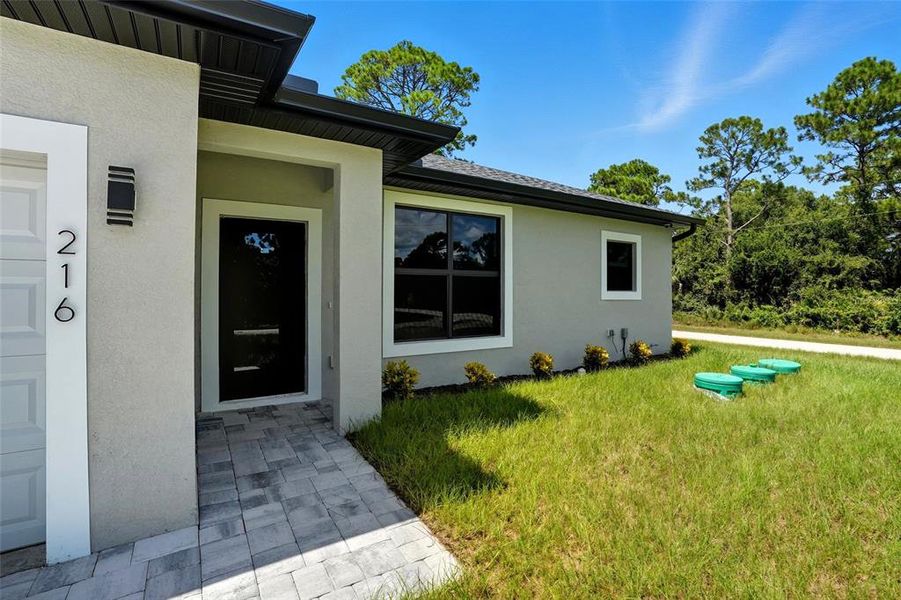 Exterior details and patio area of a home in , Lehigh Acres (Image 2).