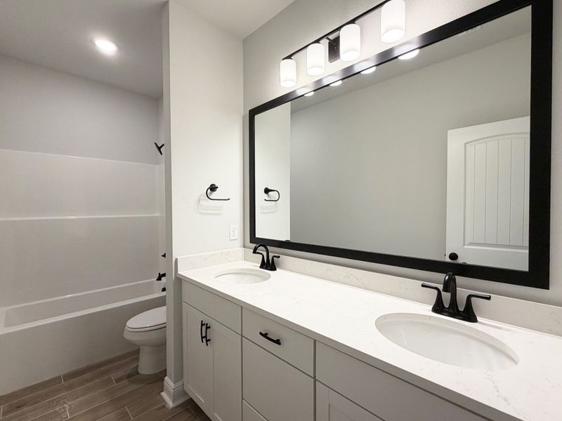 Furnished interior view inside a new home in Natureview, Freeport (Image 8).