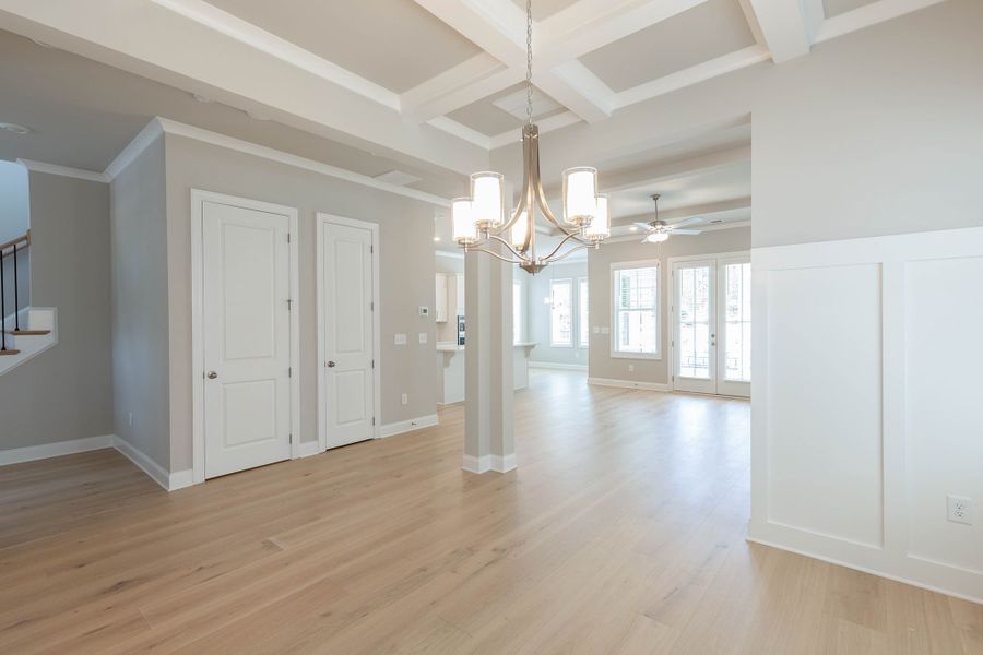 The formal dining room opens up into the family room and kitchen