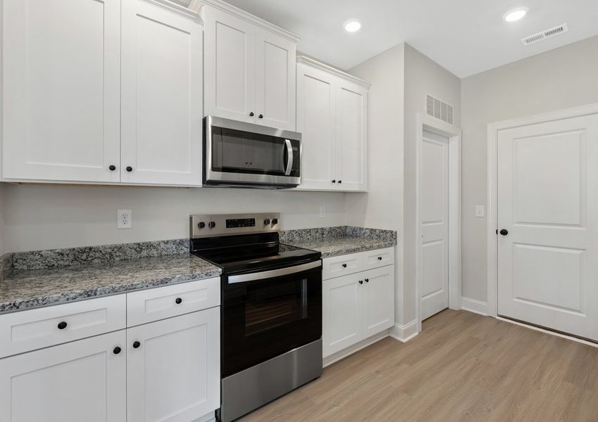 The kitchen has granite countertops