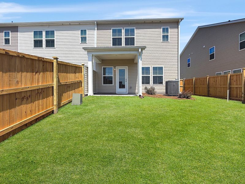 Exterior details and patio area of a home in , Summerville (Image 3).