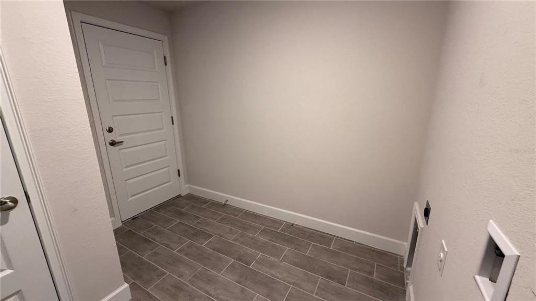 Spacious, unfurnished interior of a new home in Watercress Cove, North Port (Image 5).