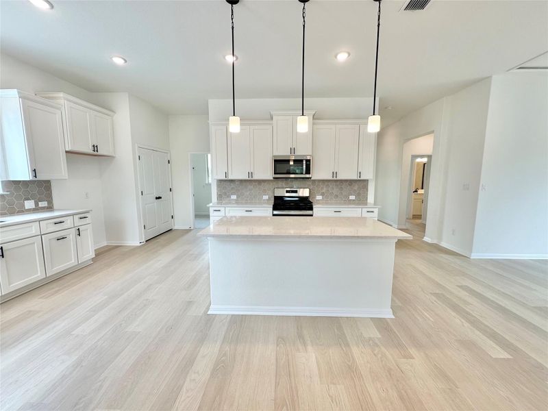 Furnished interior view inside a new home in Sage Hollow, Kyle (Image 5).