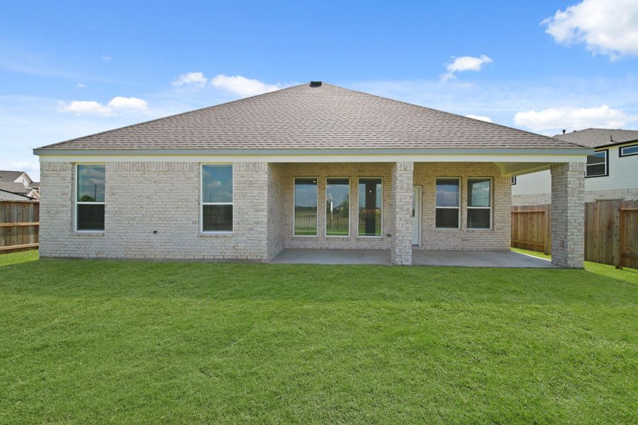 Front exterior of a new home in Beacon Hill, Waller, TX, highlighting curb appeal (Image 17). Front exterior of a new home in Beacon Hill, Waller, TX, highlighting curb appeal (Image 17).