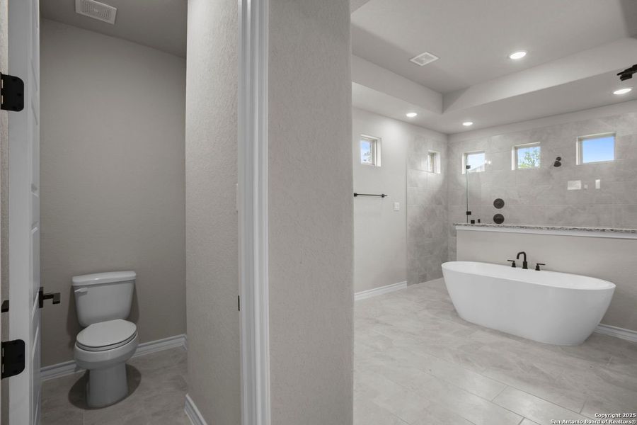 Furnished interior view inside a new home in Potranco Oaks, Castroville (Image 60).