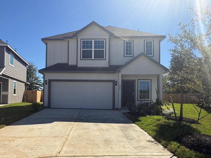 Front exterior of a new home in Cliffstone Hills, Conroe, TX, highlighting curb appeal (Image 2). Front exterior of a new home in Cliffstone Hills, Conroe, TX, highlighting curb appeal (Image 2).