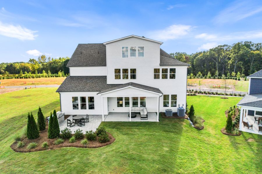 Representative exterior photo of a completed home built from the Stonegate by Pulte Homes in The Retreat at Carolina Ridge, Harrisburg, NC (Image 37). Representative exterior photo of a completed home built from the Stonegate by Pulte Homes in The Retreat at Carolina Ridge, Harrisburg, NC (Image 37).