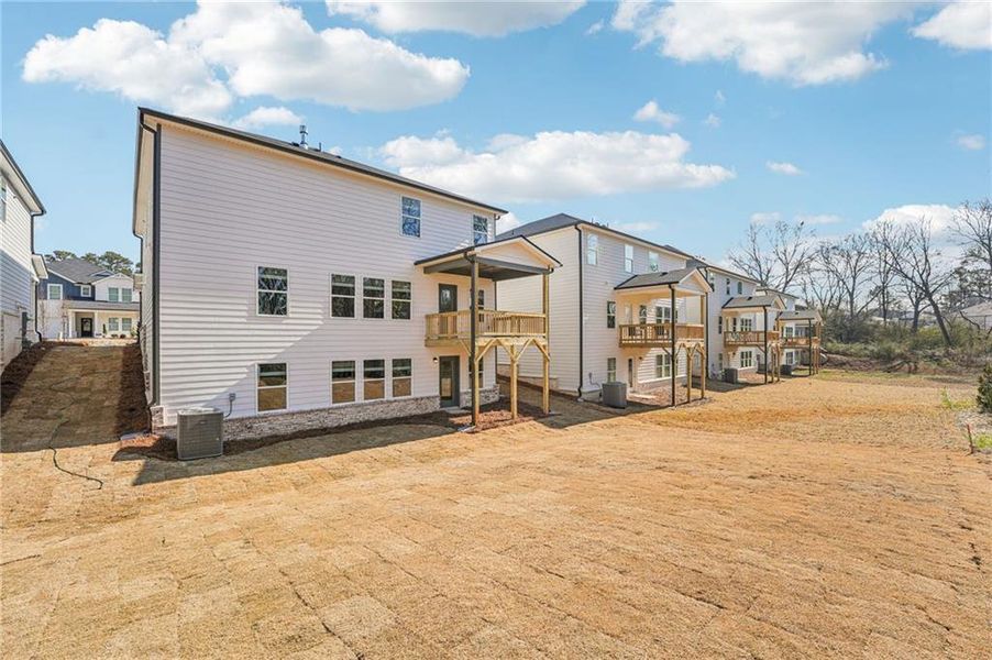 Exterior details and patio area of a home in Westmont Preserve, Powder Springs (Image 30).