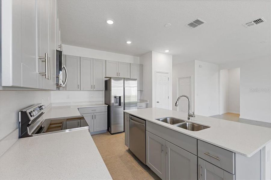 Furnished interior view inside a new home in Cypress Park Estates, Haines City (Image 5).
