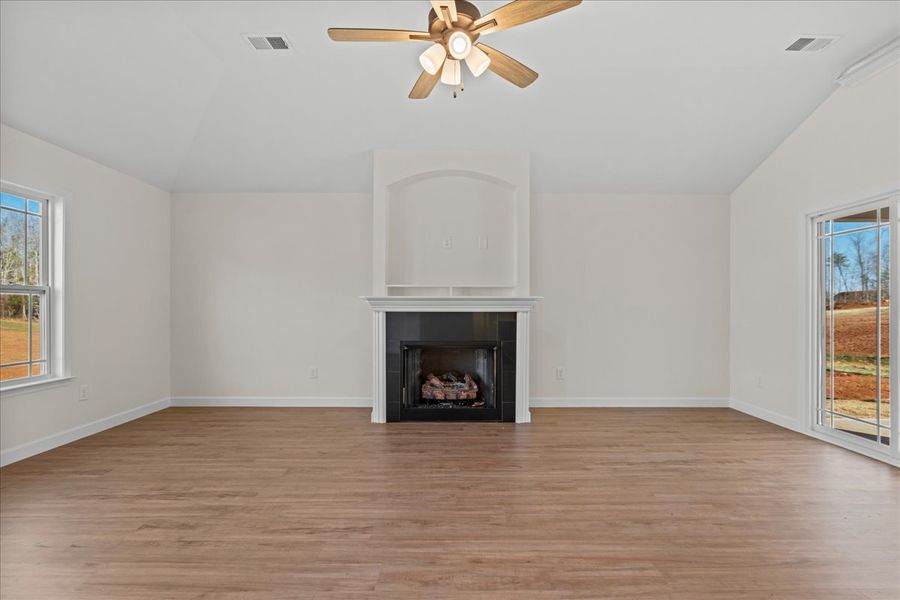 Representative unfurnished interior of a home built from the Cheshire by Enchanted Homes in Hampshire Heights, Moore (Image 32).