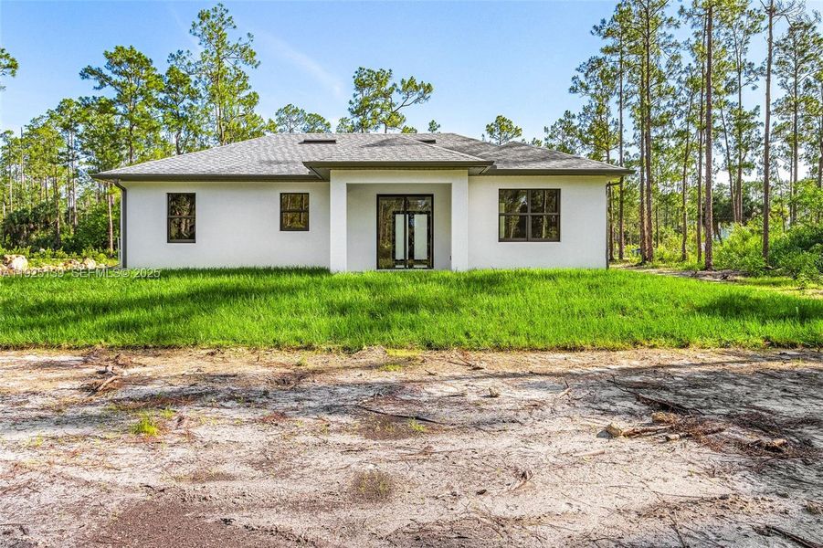 Exterior details and patio area of a home in , Naples (Image 16). Exterior details and patio area of a home in , Naples (Image 16).