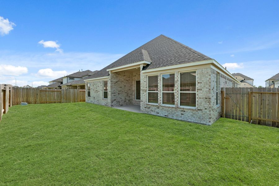 Front exterior of a new home in Briarwood Crossing, Rosenberg, TX, highlighting curb appeal (Image 17).