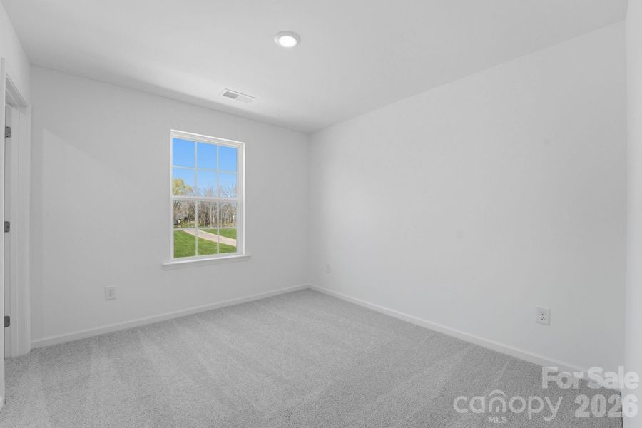 Spacious, unfurnished interior of a new home in Cannon Village, York (Image 10).