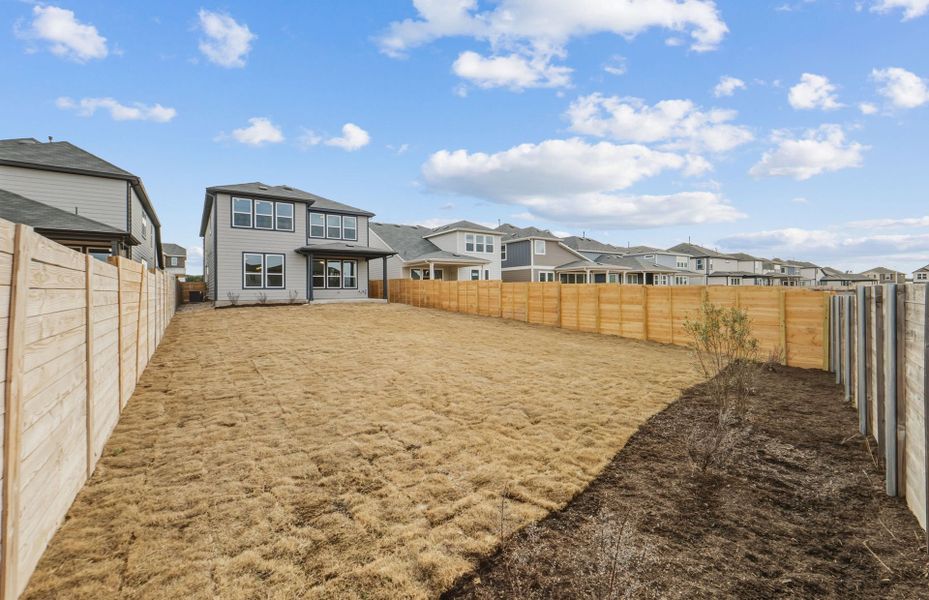Exterior details and patio area of a home in Horizon Lake, Leander (Image 23).