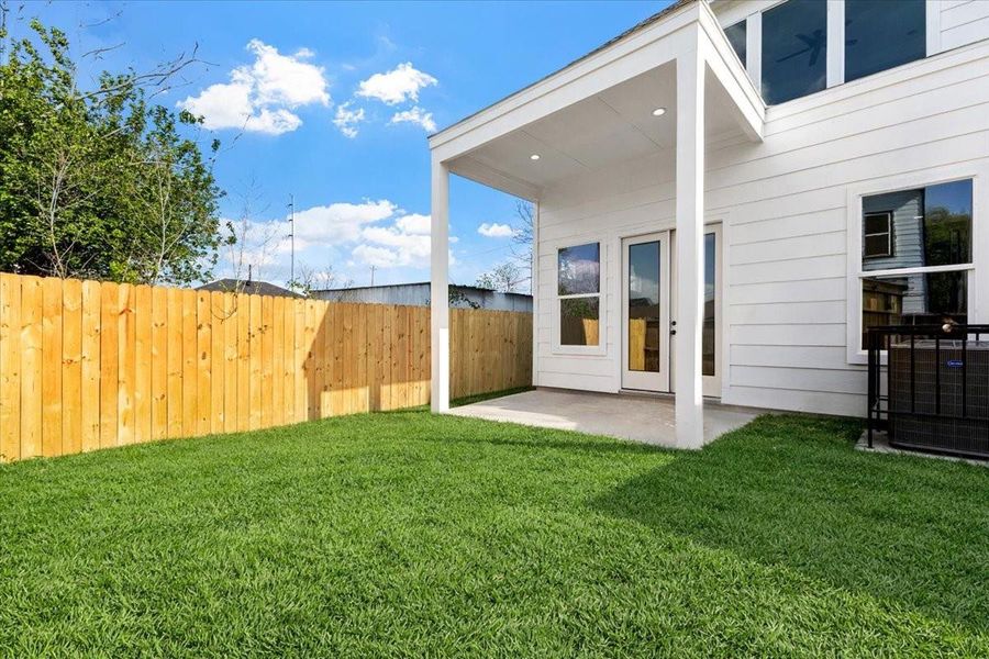 Exterior details and patio area of a home in , Houston (Image 3).