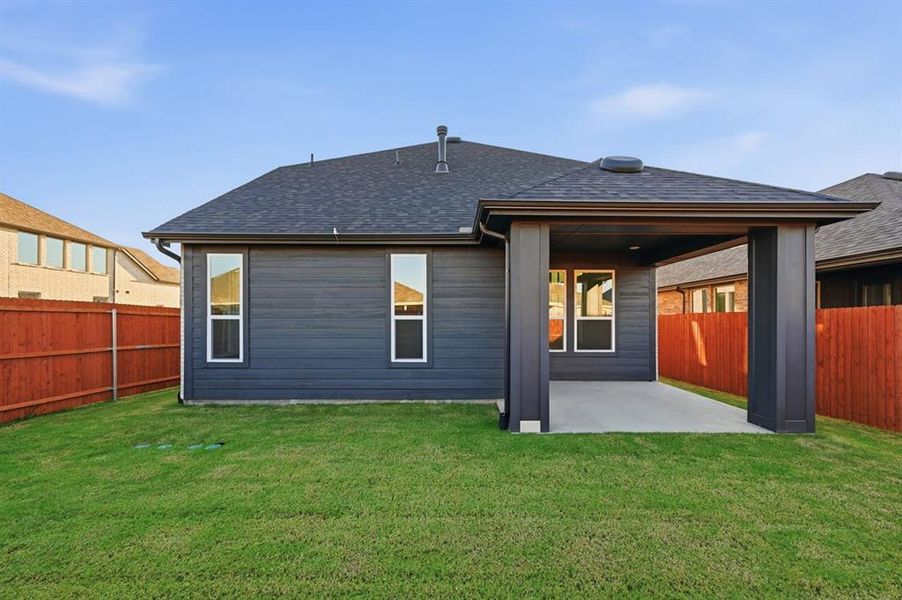 Exterior details and patio area of a home in Heartland, Heartland (Image 2). Exterior details and patio area of a home in Heartland, Heartland (Image 2).
