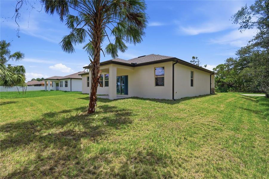 Exterior details and patio area of a home in , North Port (Image 17).