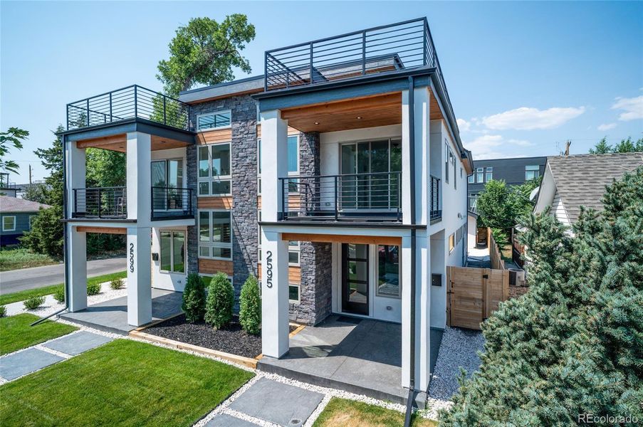 Front exterior of a new home in , Denver, CO, highlighting curb appeal (Image 21).