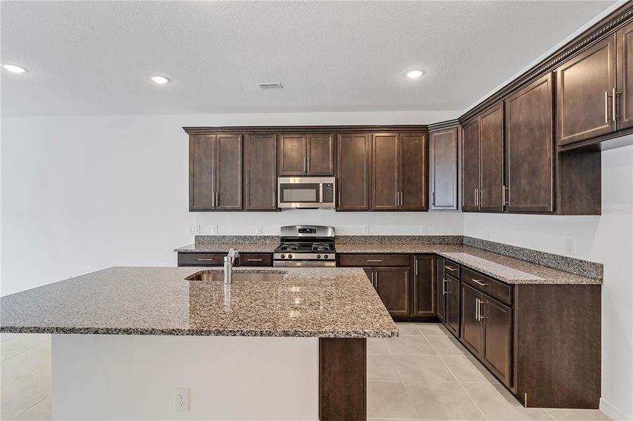 Furnished interior view inside a new home in Osprey Ranch Townhomes, Winter Garden (Image 7).