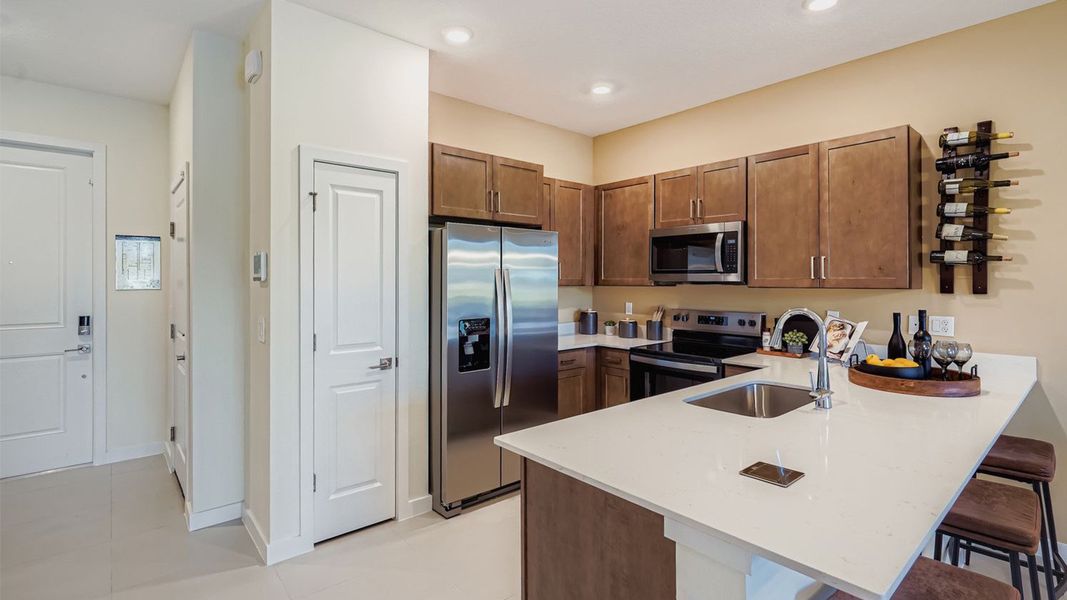 Representative furnished interior of a home built from the Waverly by D.R. Horton in Lakeside Landing, Royal Palm Beach (Image 12).