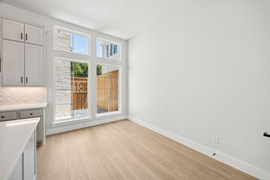 Representative unfurnished interior of a home built from the Washington by Centre Living Homes in Newman Village Townhomes, Frisco (Image 17).