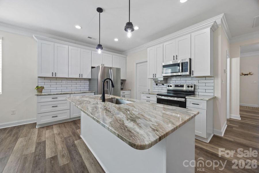 Furnished interior view inside a new home in , Monroe (Image 6).
