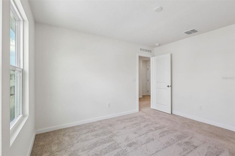 Spacious, unfurnished interior of a new home in Cyrene at Harmony, St. Cloud (Image 17). Spacious, unfurnished interior of a new home in Cyrene at Harmony, St. Cloud (Image 17).