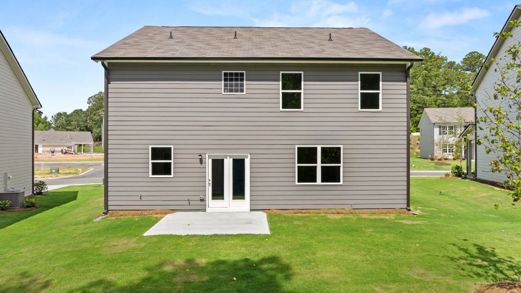 Representative exterior photo of a completed home built from the Hanover by D.R. Horton in Northwoods at Mirror Lake, Villa Rica, GA (Image 25).