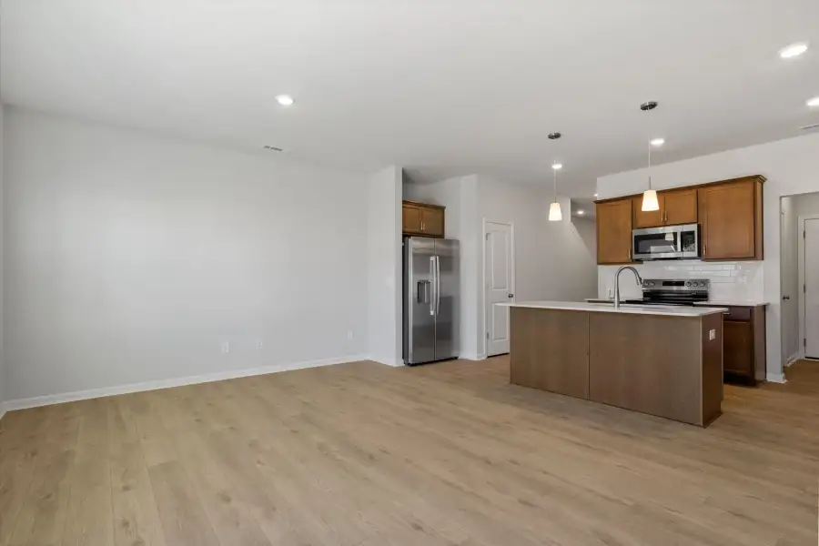 Spacious, unfurnished interior of a new home in West Main Townhomes, Sanford (Image 17).