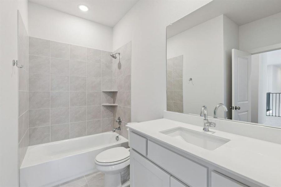 Friends and family will feel right at home in any of the beautifully fininshed guest baths.