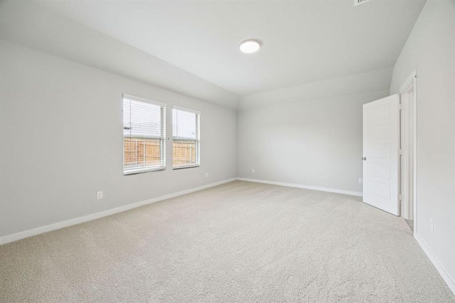 Primary Suite in the Hayden home plan by Trophy Signature Homes – REPRESENTATIVE PHOTO