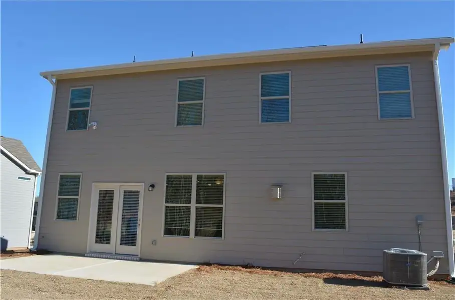 Front exterior of a new home in , Braselton, GA, highlighting curb appeal (Image 1). Front exterior of a new home in , Braselton, GA, highlighting curb appeal (Image 1).