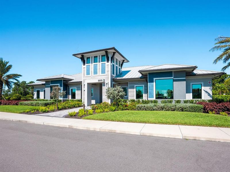 Front exterior of a new home in , Lakewood Ranch, FL, highlighting curb appeal (Image 19).
