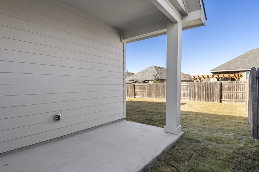 Exterior details and patio area of a home in Crosswinds, Kyle (Image 27).