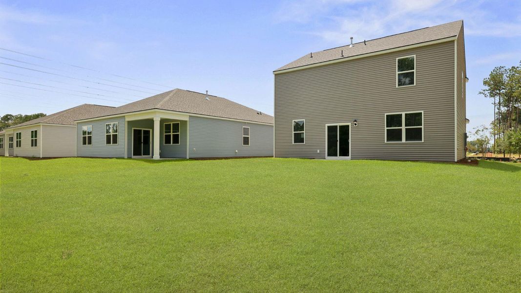 Front exterior of a new home in Pineview North, Summerville, SC, highlighting curb appeal (Image 28).