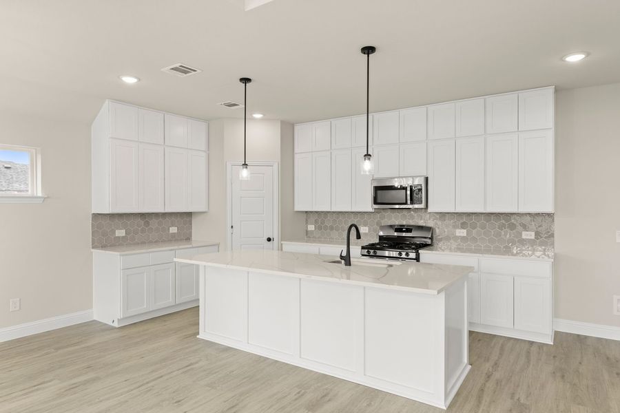 Furnished interior view inside a new home in Creekside, Royse City (Image 9).