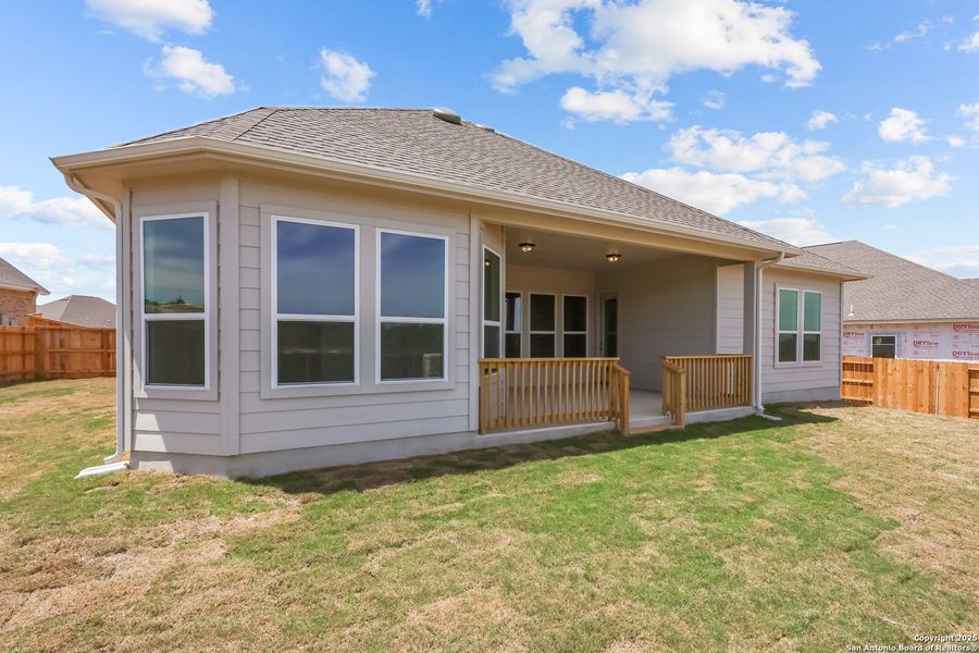Front exterior of a new home in Homestead, Schertz, TX, highlighting curb appeal (Image 1).