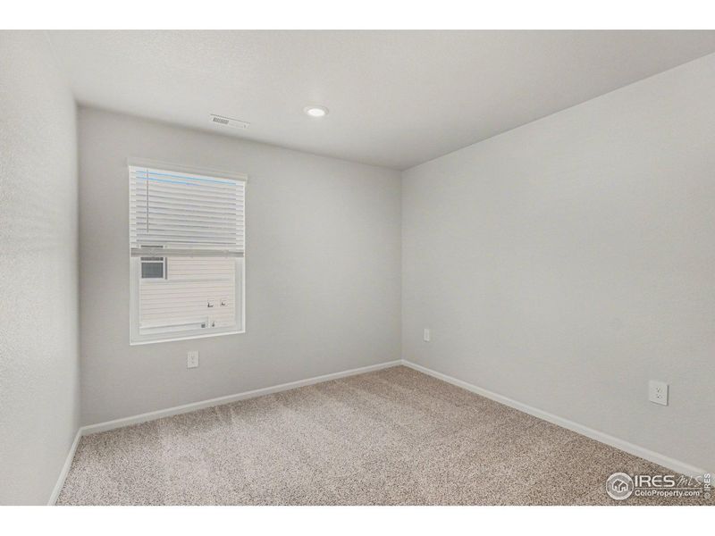 Spacious, unfurnished interior of a new home in Poudre Heights: The Meadow Collection, Windsor (Image 22).