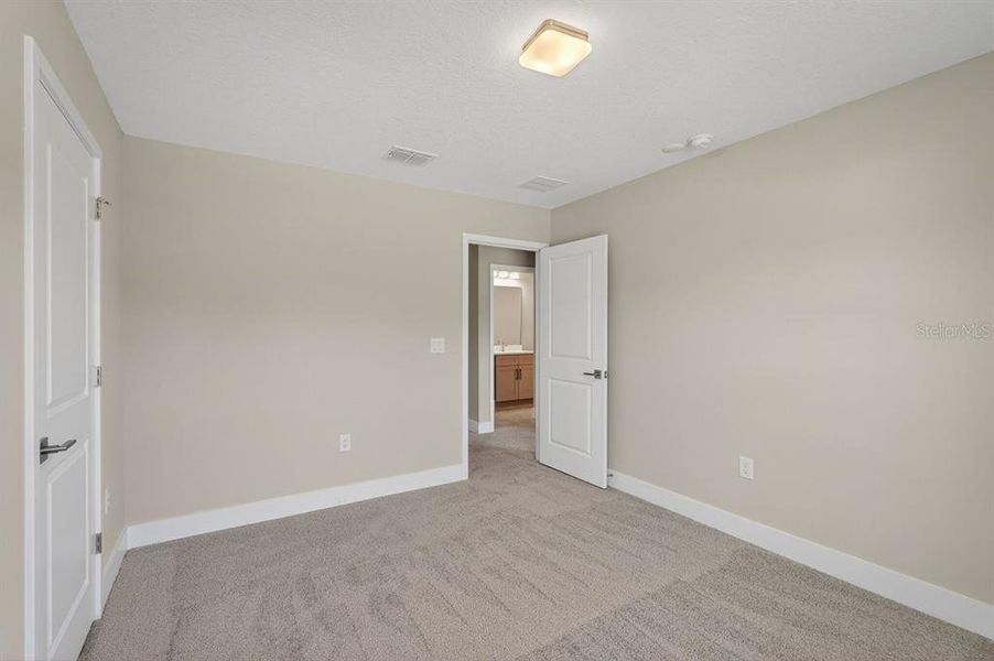 Spacious, unfurnished interior of a new home in Gray Hawk at Hole Two, Daytona Beach (Image 46).