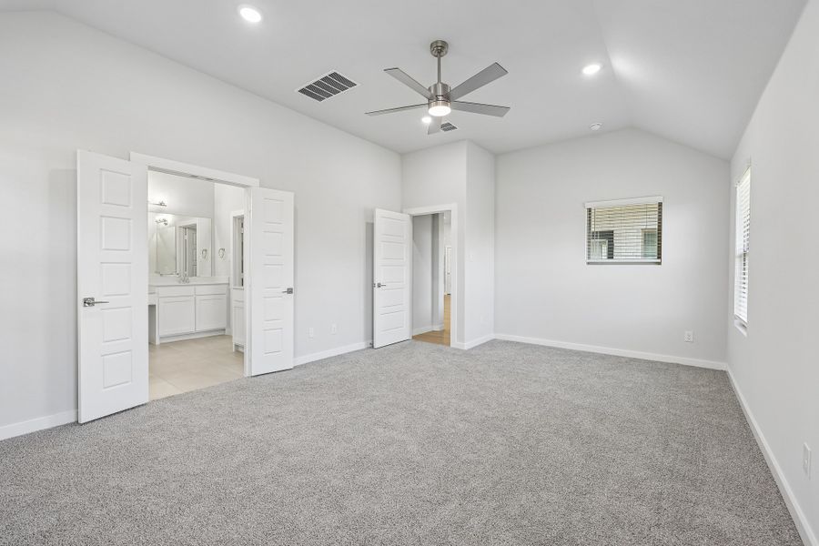 Primary Bedroom in the Gilmour II home plan by Trophy Signature Homes